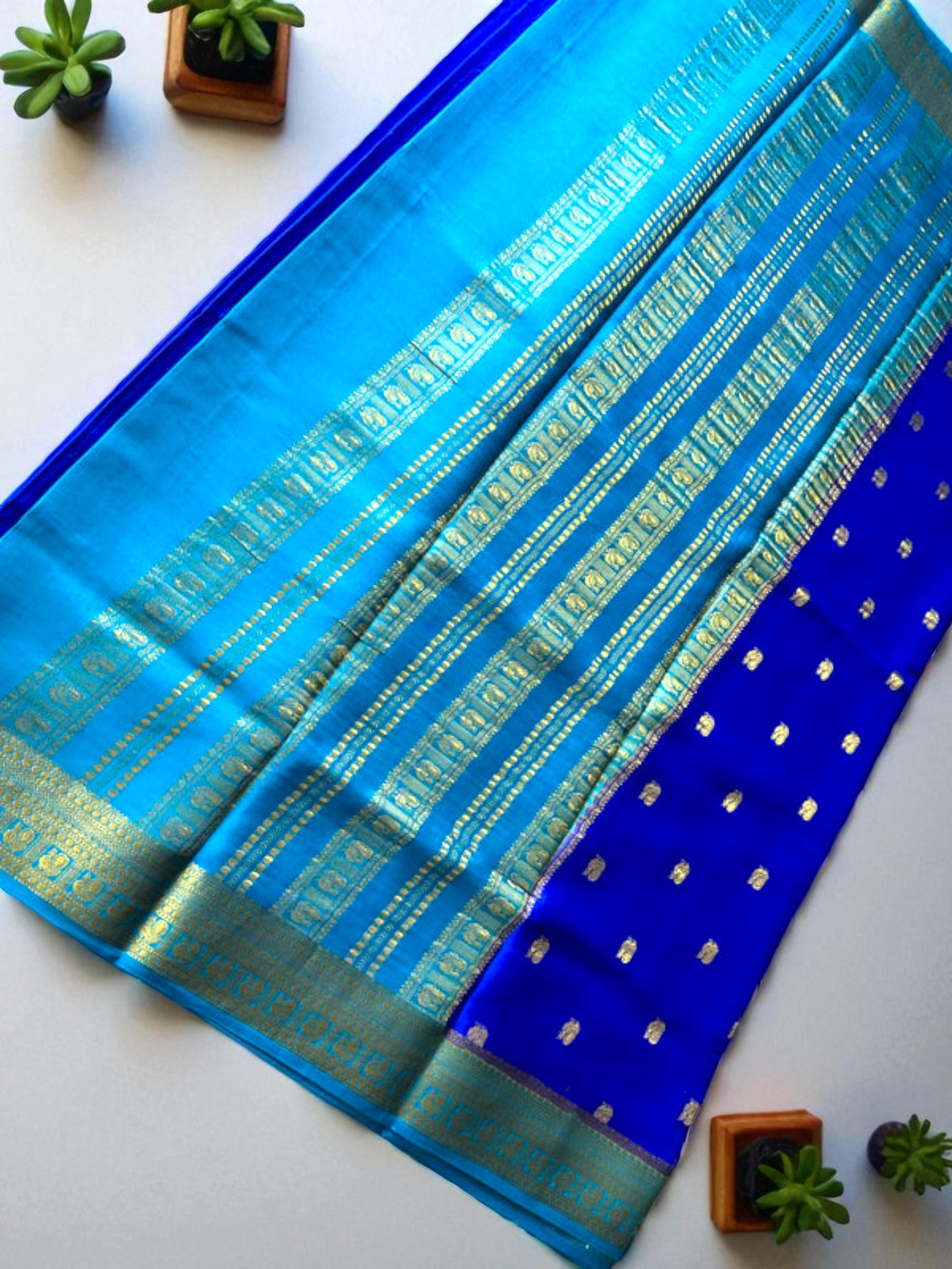 Navy blue- sea green peacock butta pure crepe silk saree