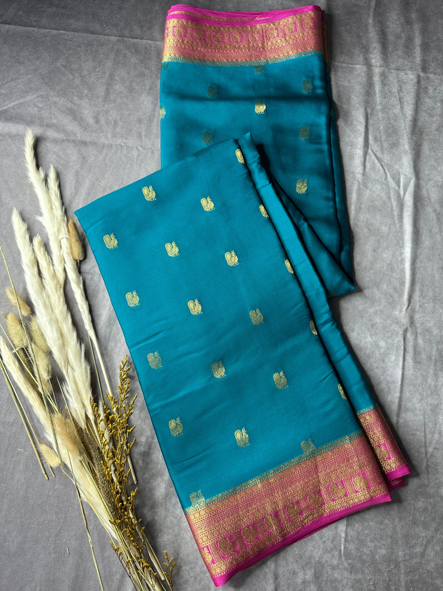 Peacock green- magenta butta pure crepe silk saree