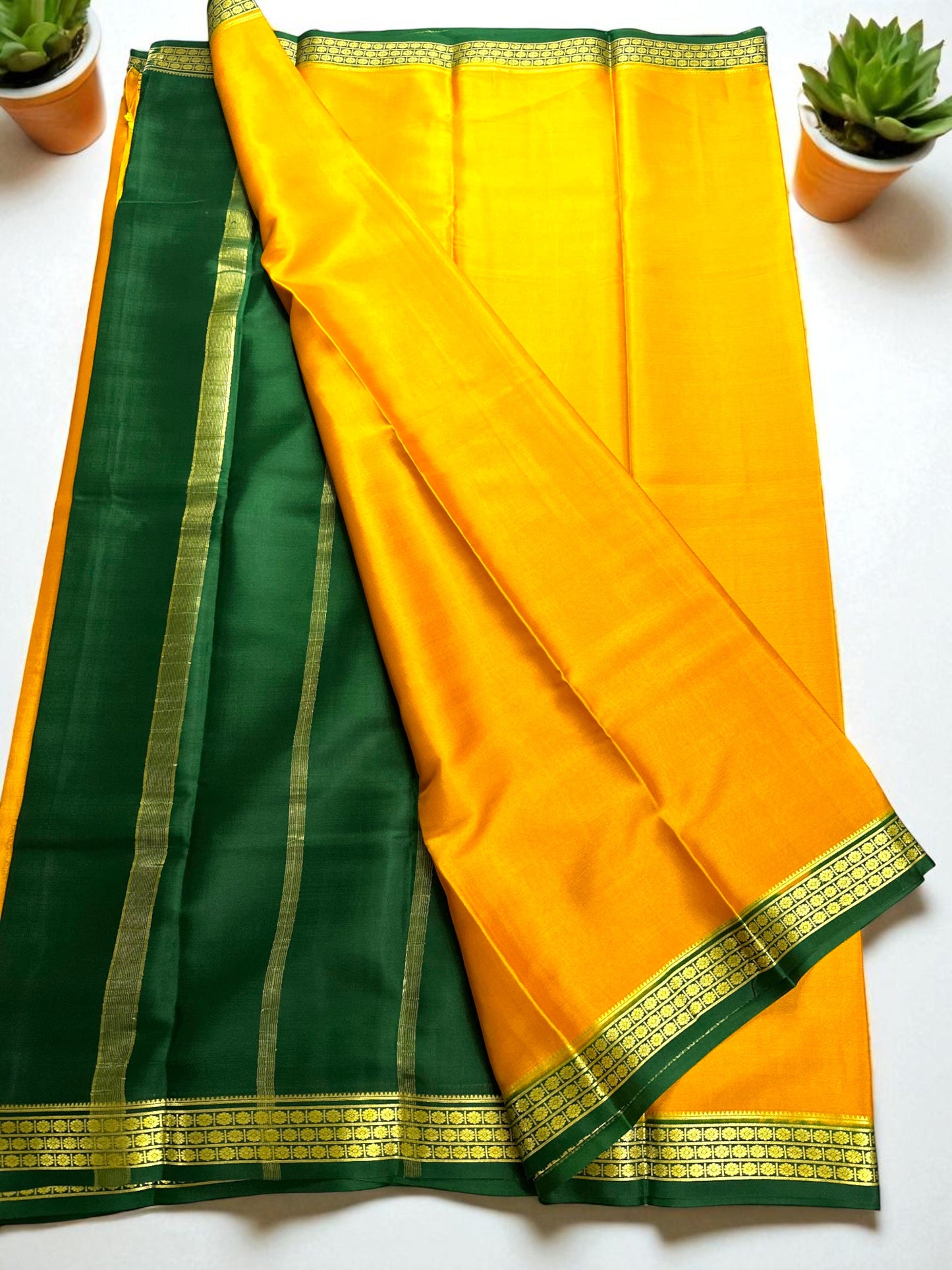 Mustard yellow- green ashwini pure crepe silk saree