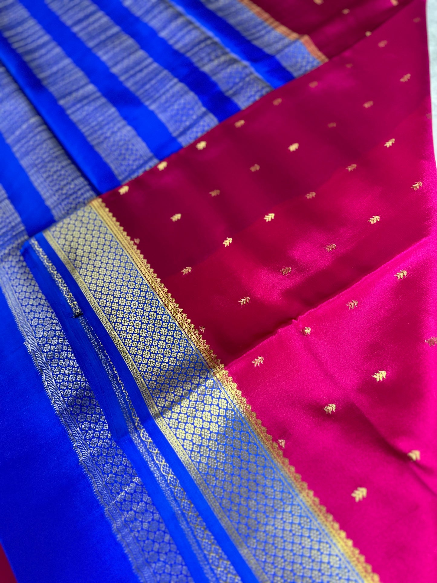 Rani pink- blue arrow butta pure crepe silk saree