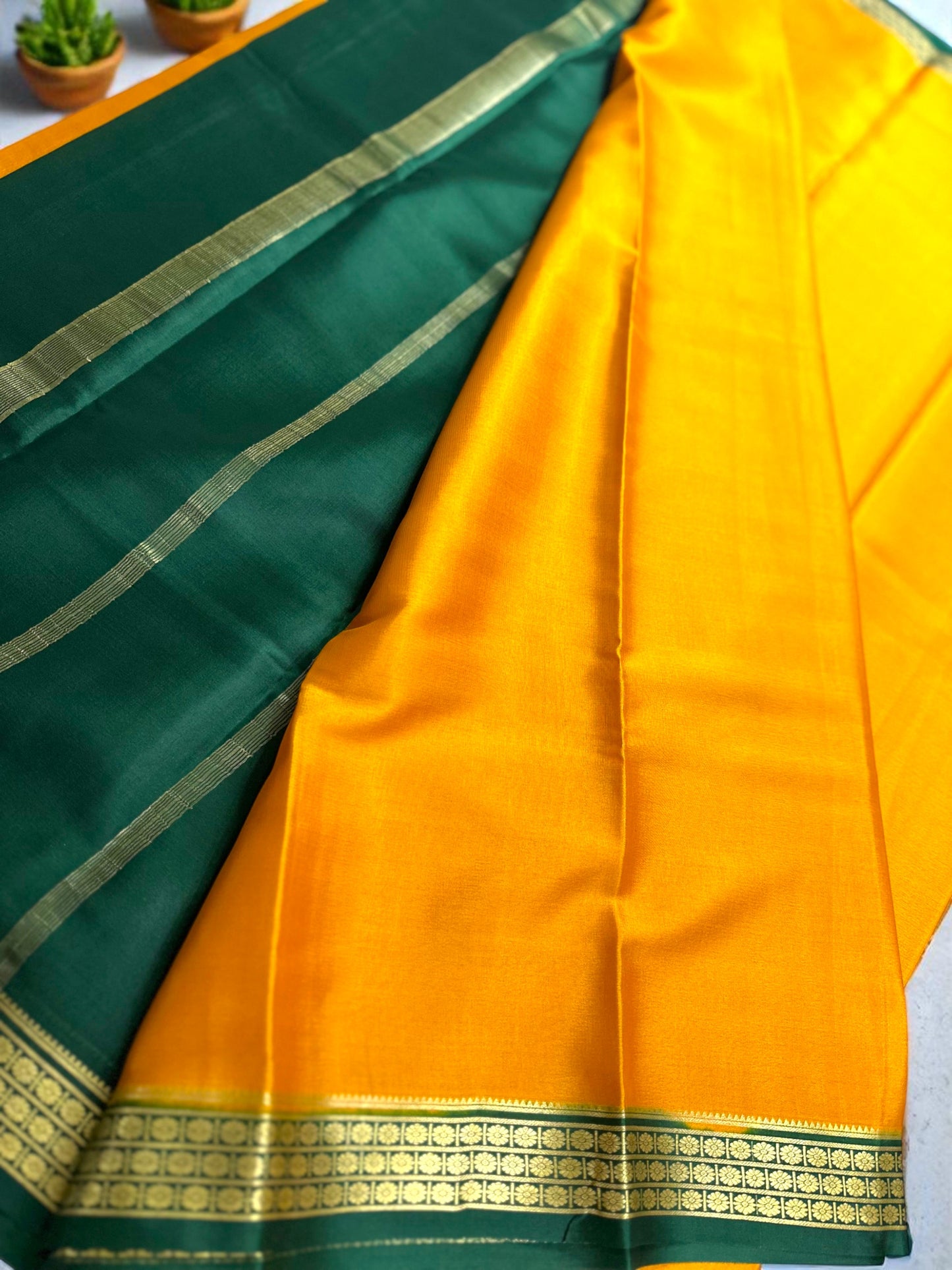 Mustard yellow- green ashwini pure crepe silk saree