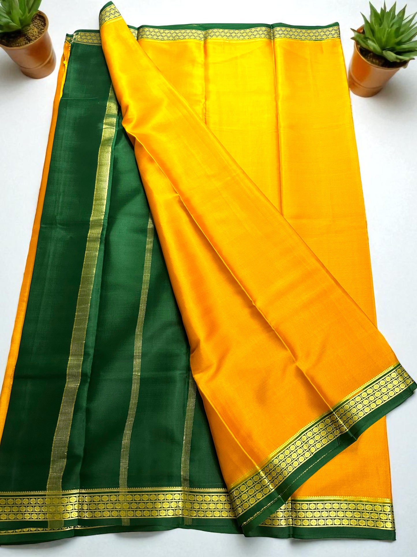 Mustard yellow- green ashwini pure crepe silk saree