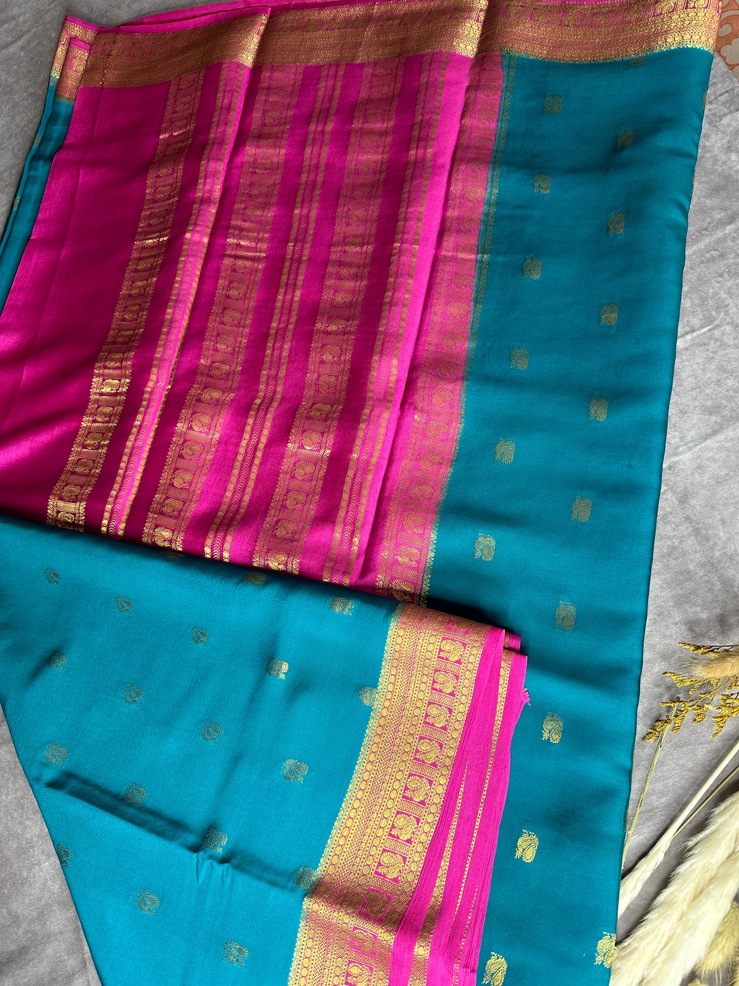 Peacock green- magenta butta pure crepe silk saree