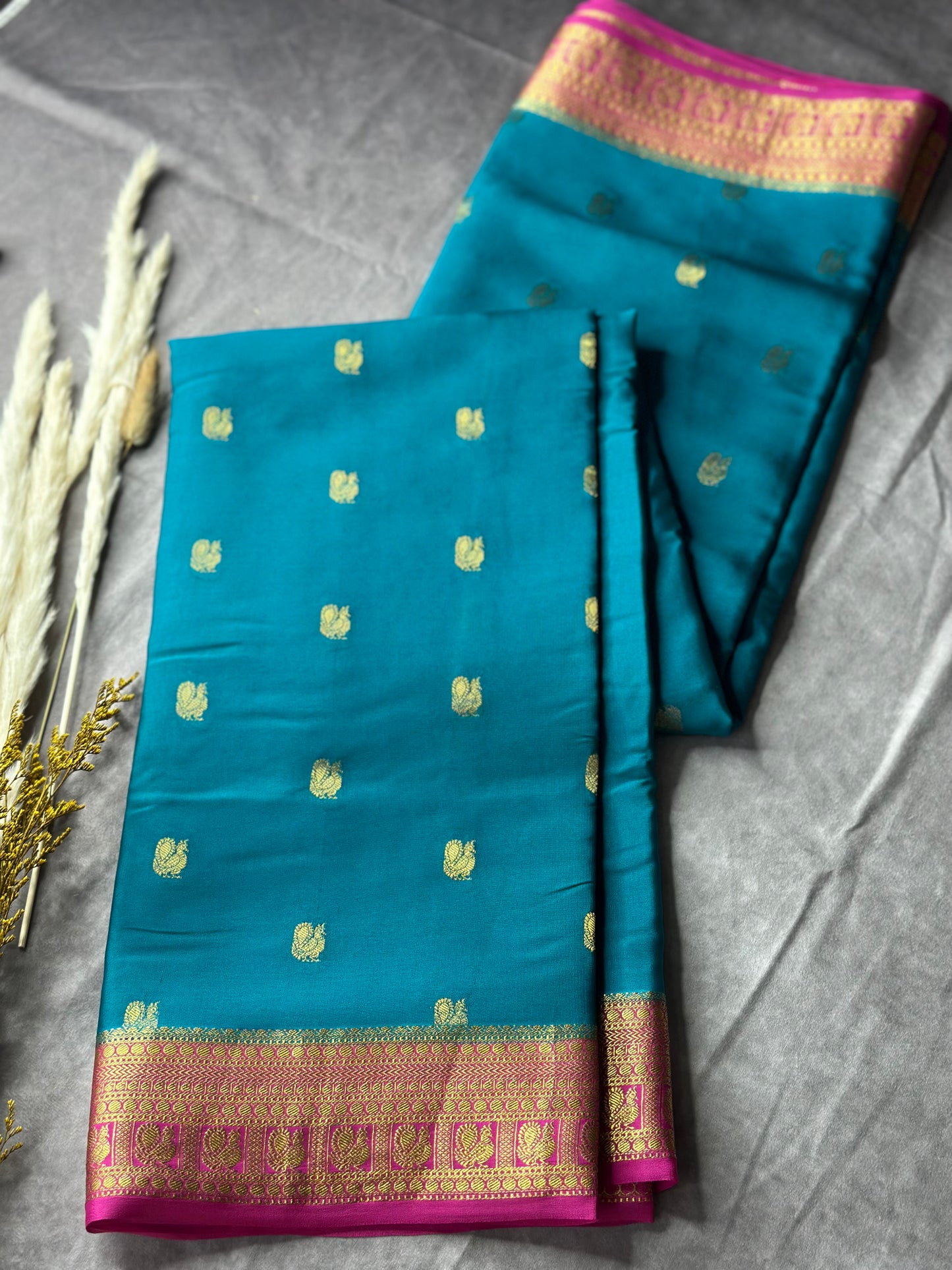 Peacock green- magenta butta pure crepe silk saree