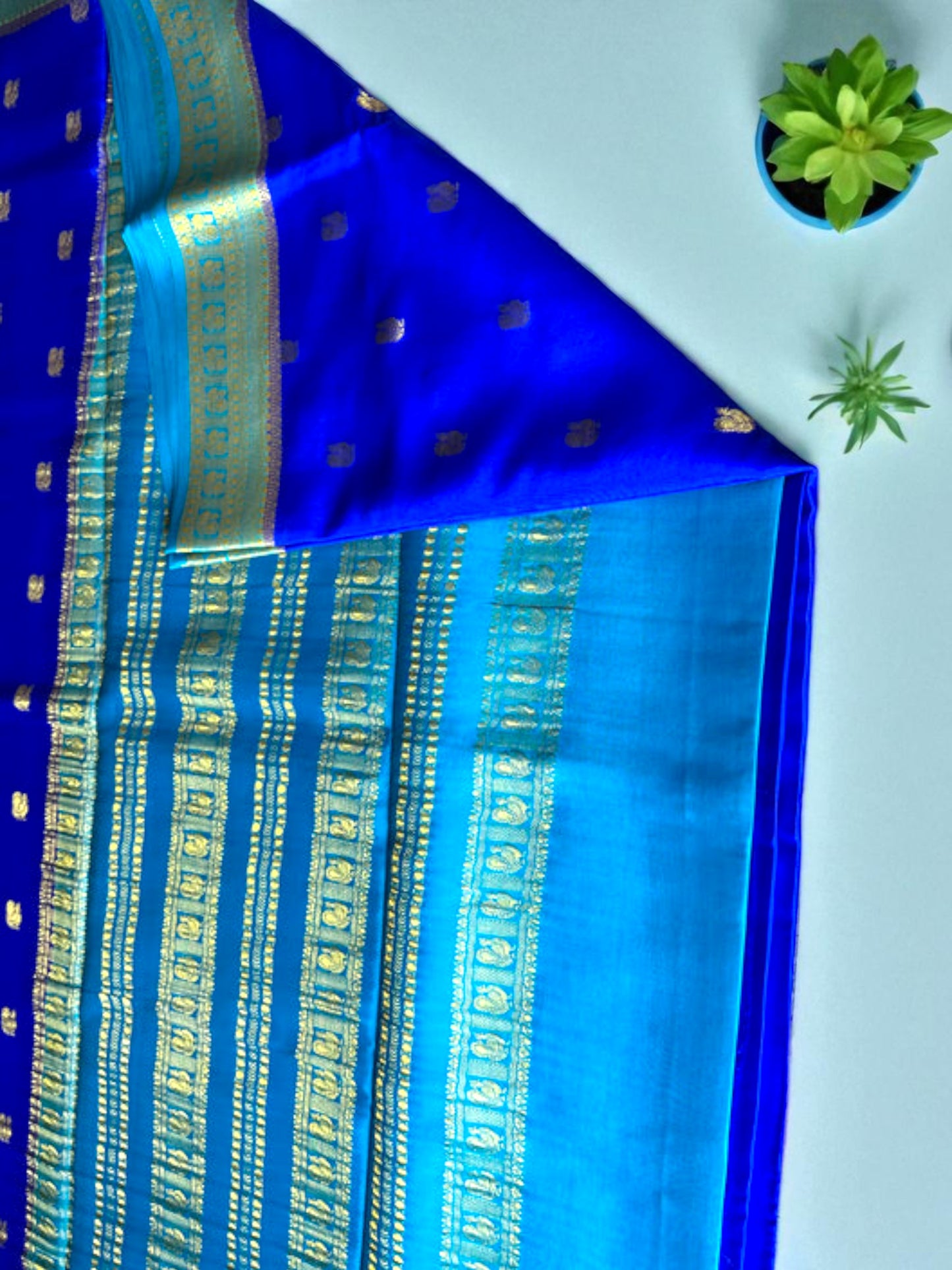 Navy blue- sea green peacock butta pure crepe silk saree