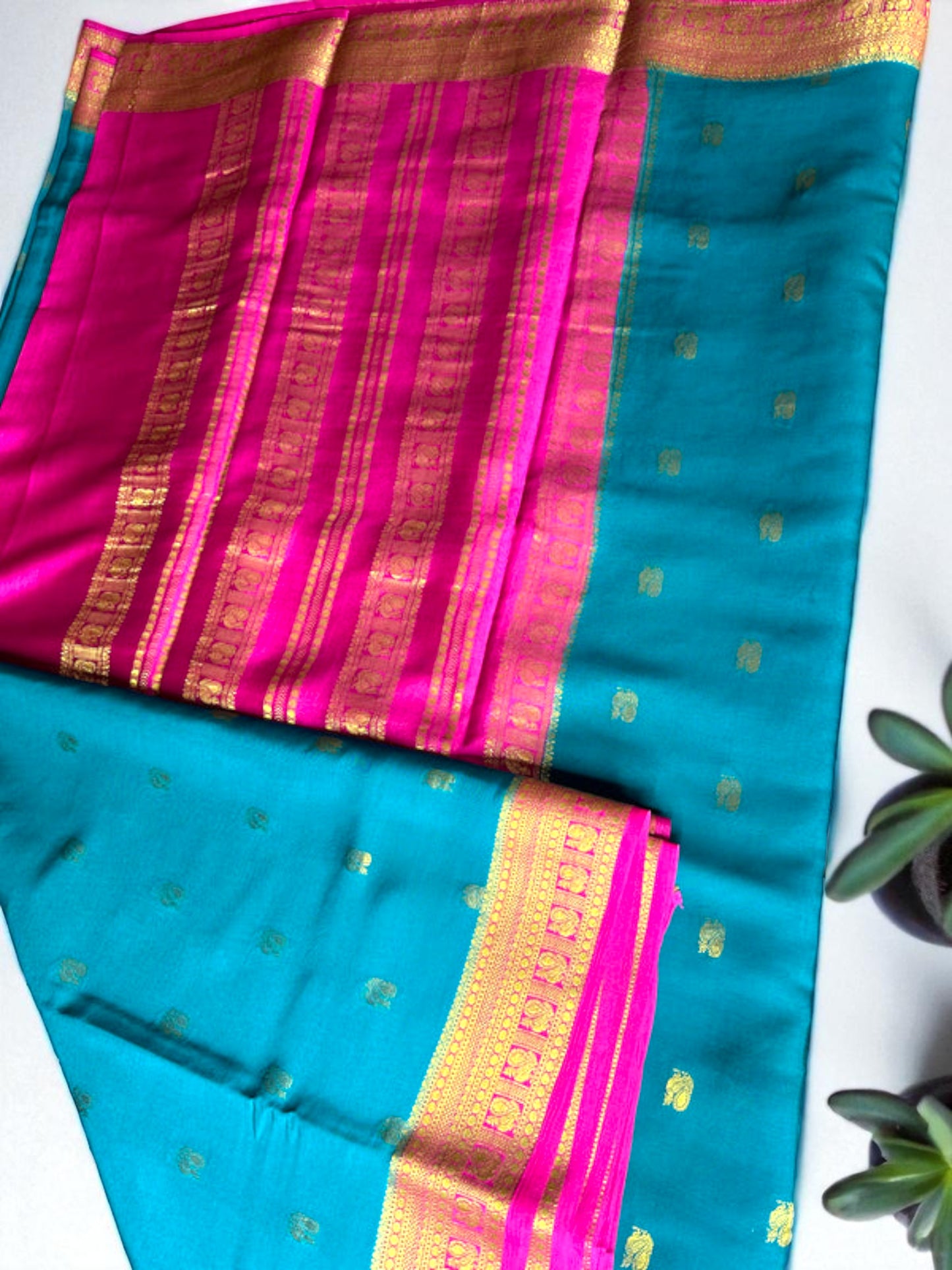 Peacock green- magenta butta pure crepe swan silk saree