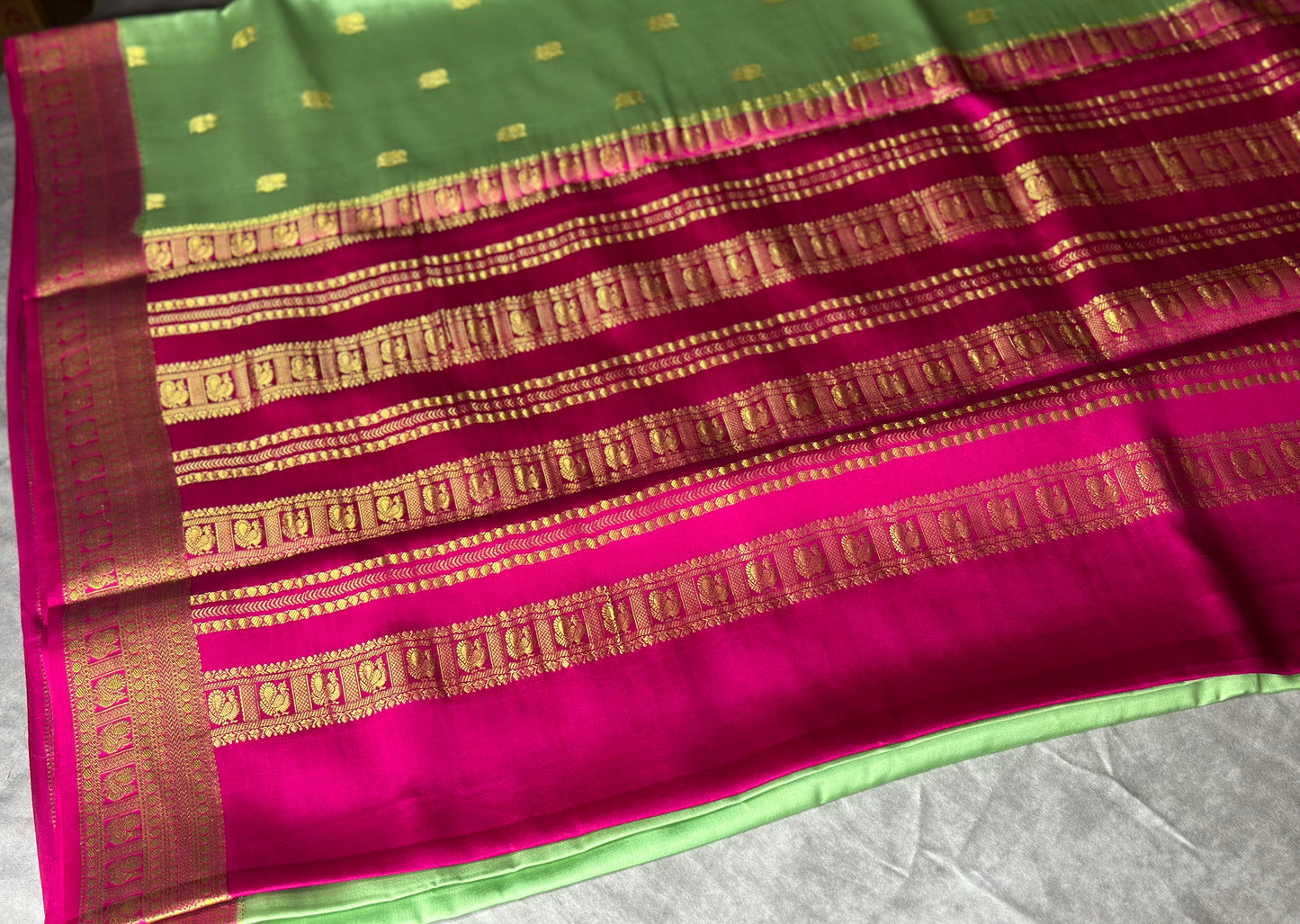 Mint green-magenta pure crepe butta silk saree