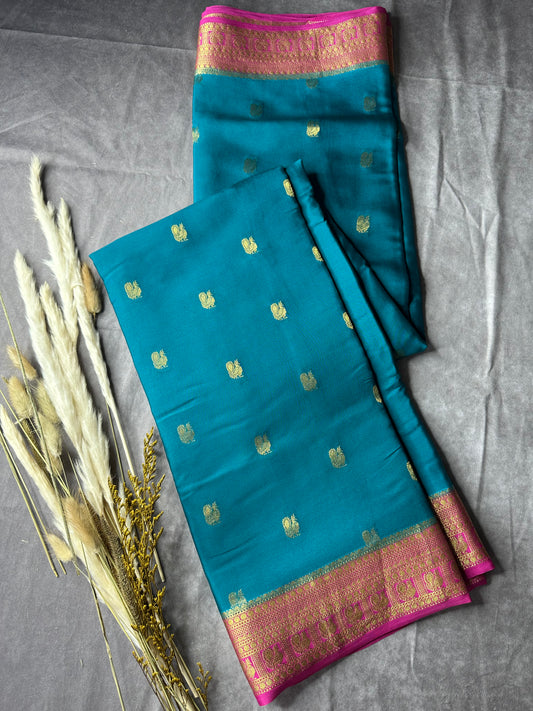 Peacock green- magenta butta pure crepe silk saree