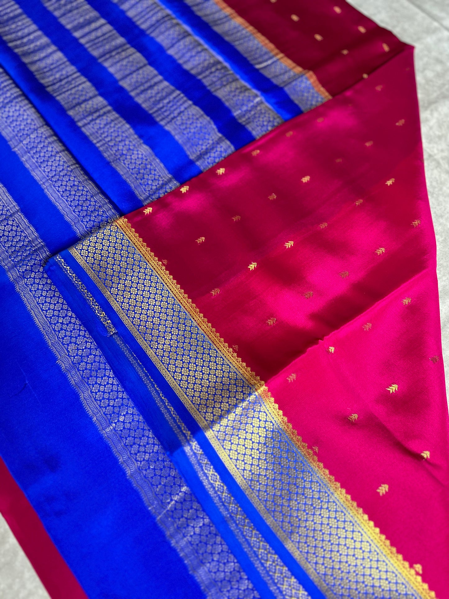 Rani pink- blue arrow butta pure crepe silk saree