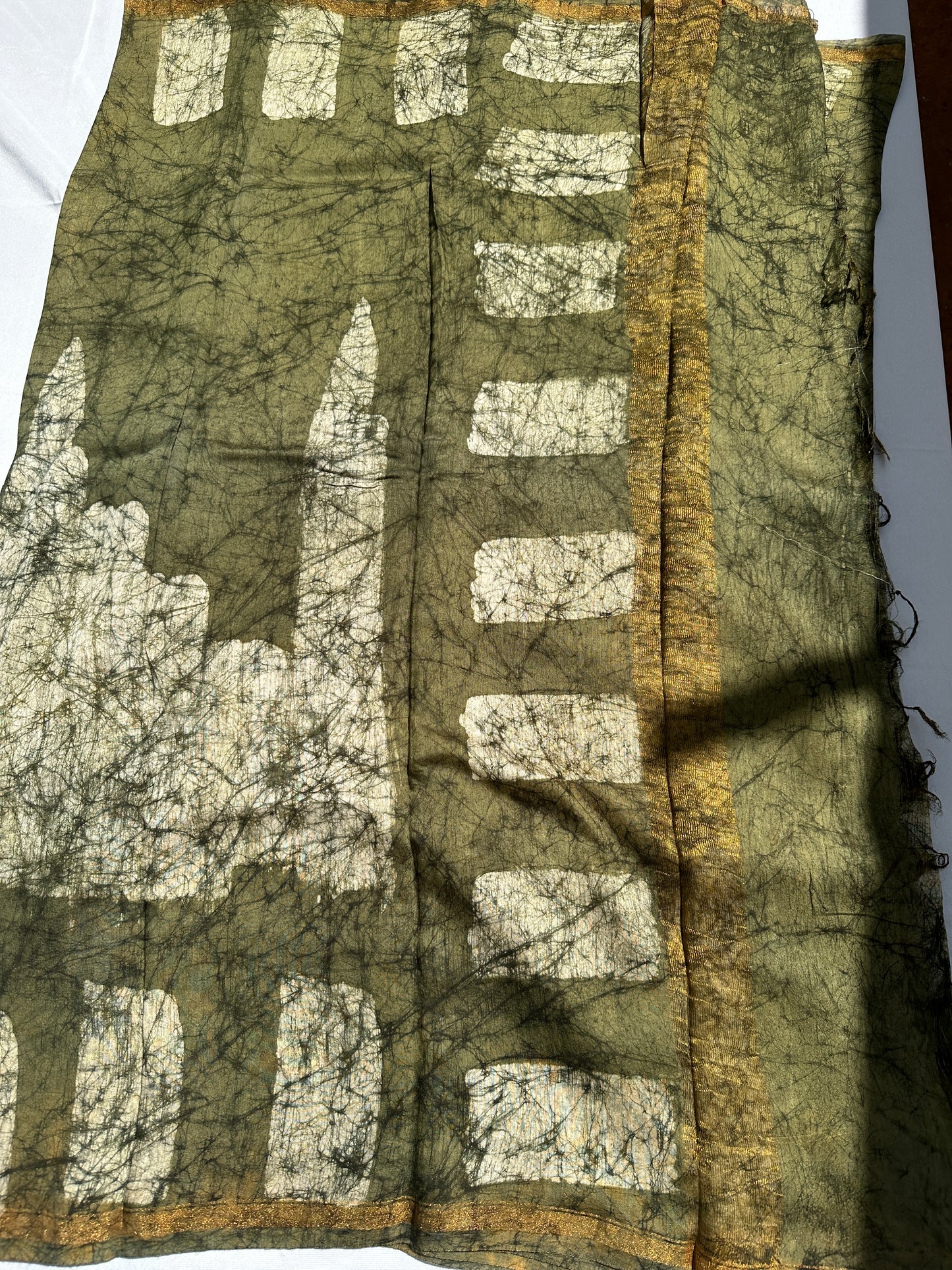 Forest green Cotton batik print zari less saree