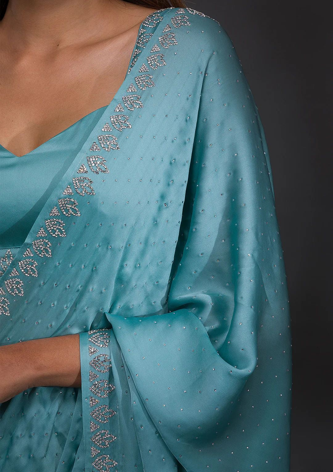 Sky blue Chinnon crepe with diamond work saree