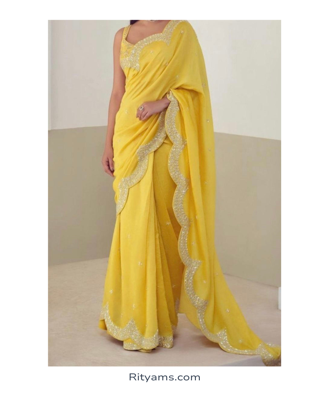 Yellow organza hand embroidery saree