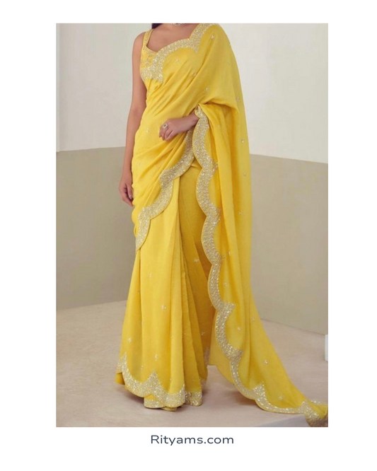 Yellow organza hand embroidery saree