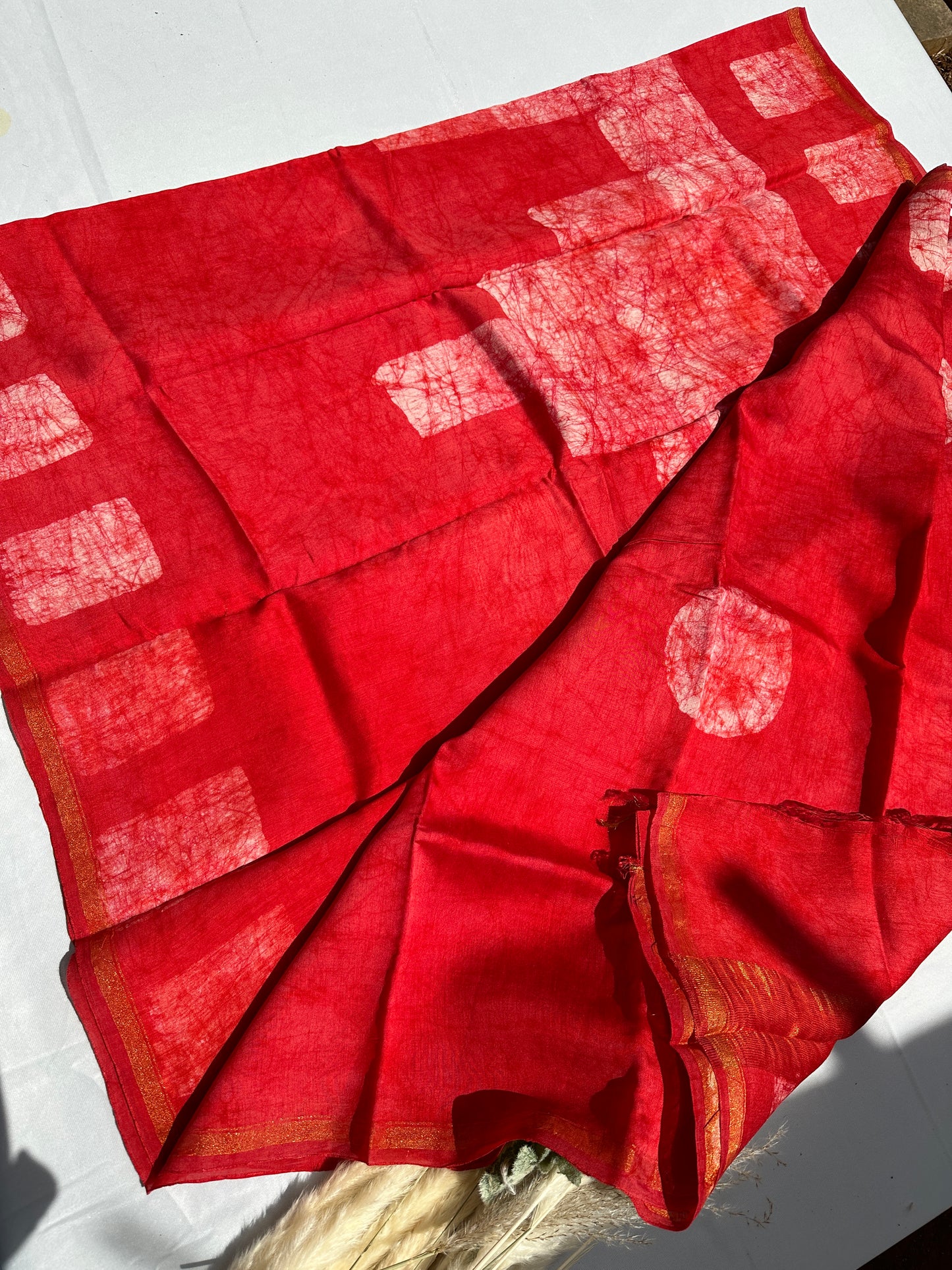 Red Cotton batik print zari less saree