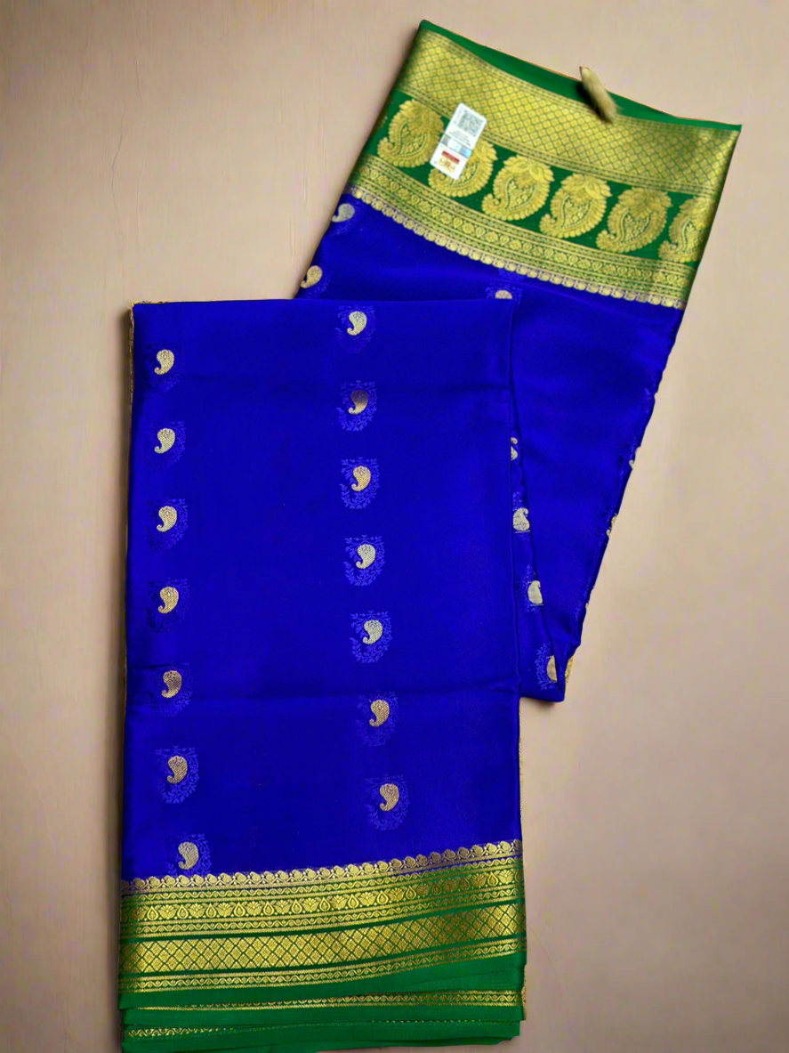 Indigo-peacock green mango embose butta pure crepe silk saree