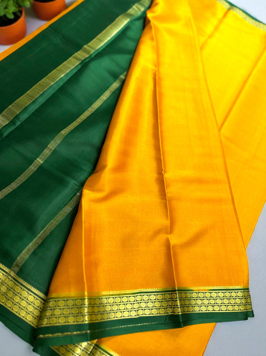 Mustard yellow- green ashwini pure crepe silk saree