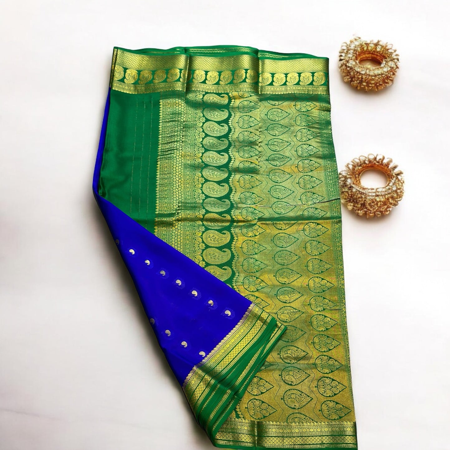 Indigo-peacock green mango embose butta pure crepe silk saree