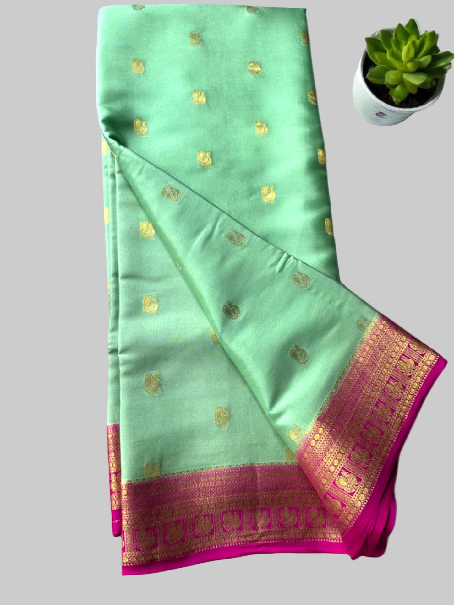 Mint green-magenta pure crepe swan silk saree