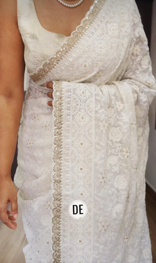 Off-white Chikankari saree with borders