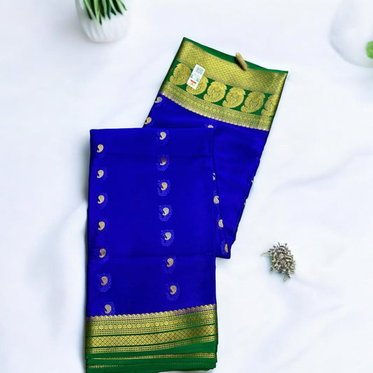 Indigo-peacock green mango embose butta pure crepe silk saree