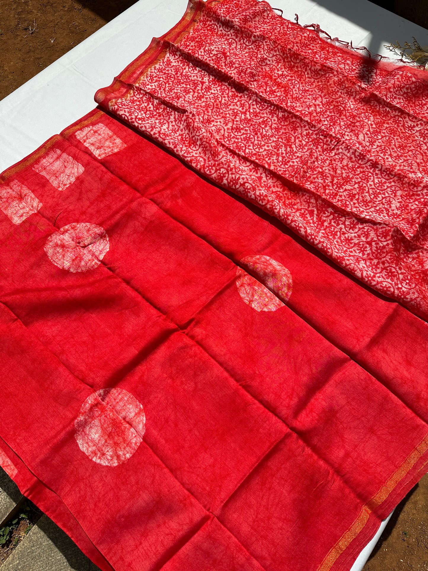 Red Cotton batik print zari less saree