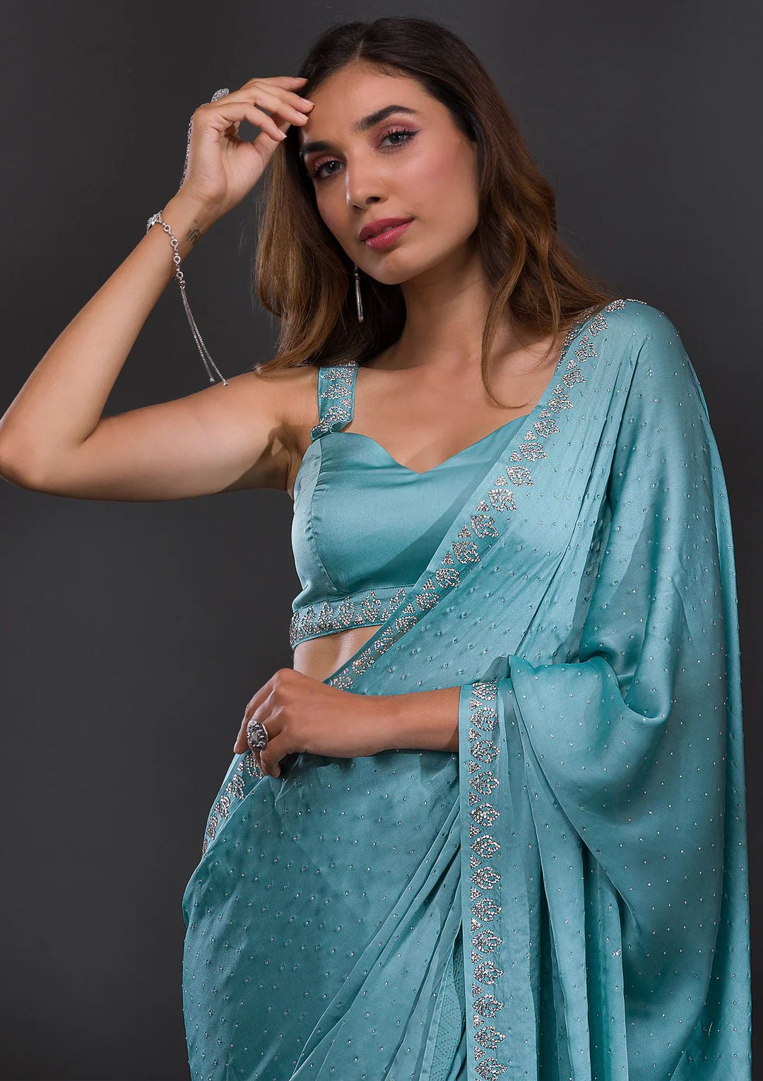 Sky blue Chinnon crepe with diamond work saree