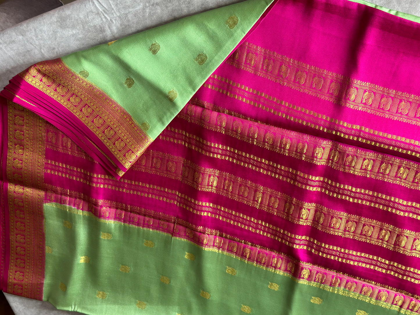 Mint green-magenta pure crepe butta silk saree