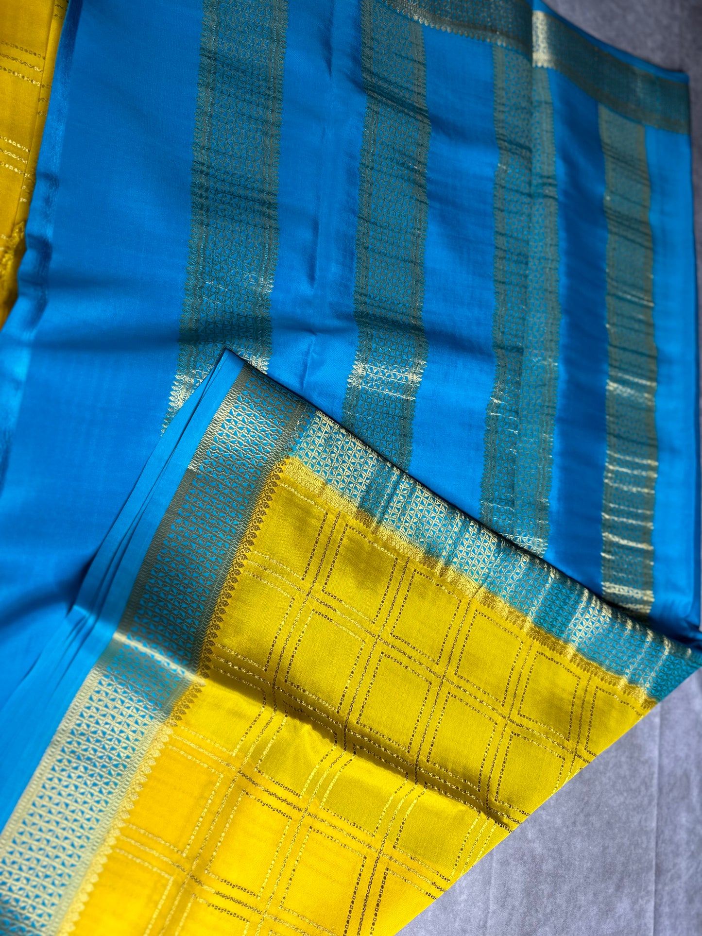 Yellow- blue 3Line box crepe saree