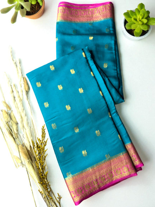 Peacock green- magenta butta pure crepe swan silk saree