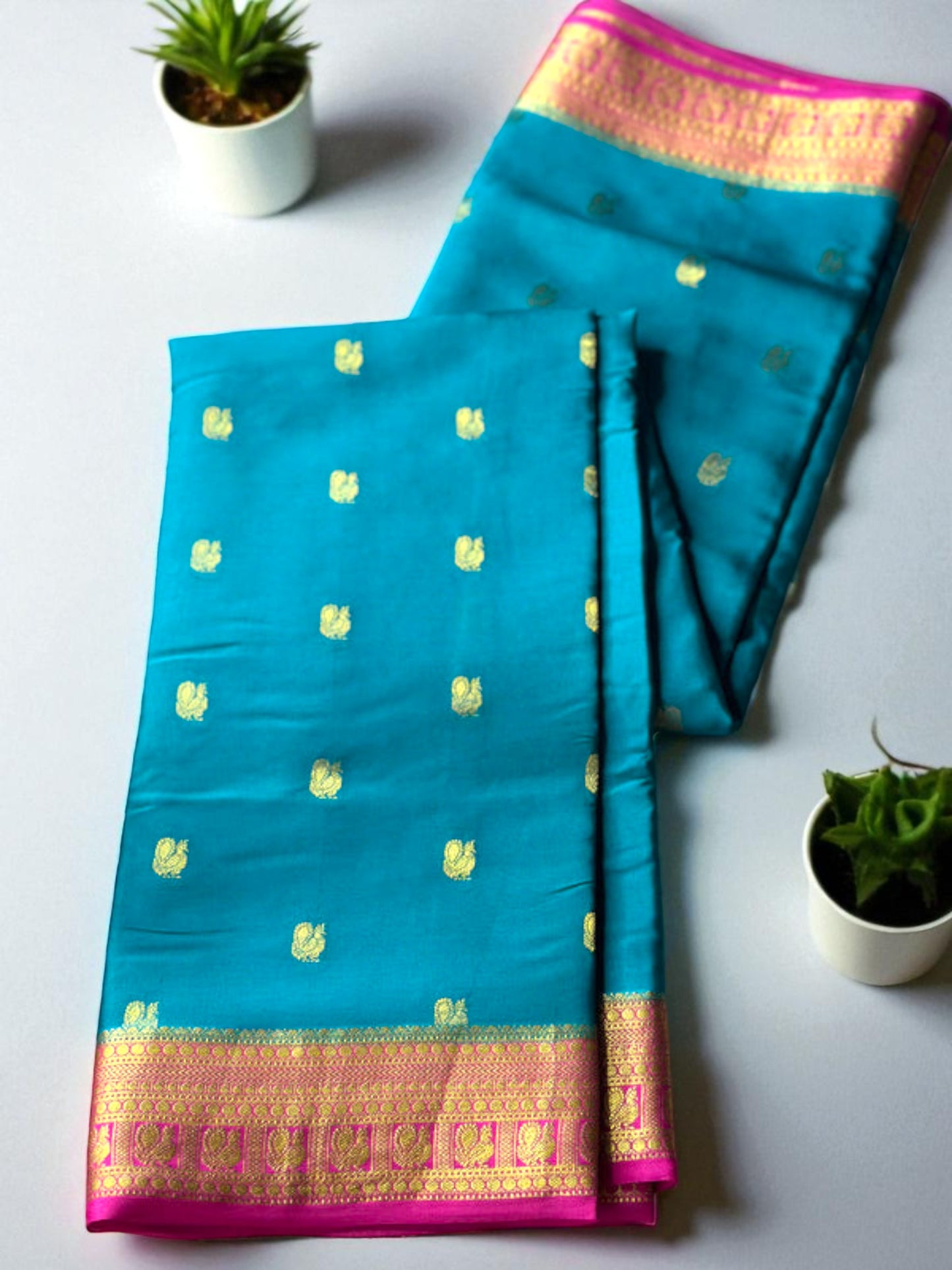 Peacock green- magenta butta pure crepe swan silk saree