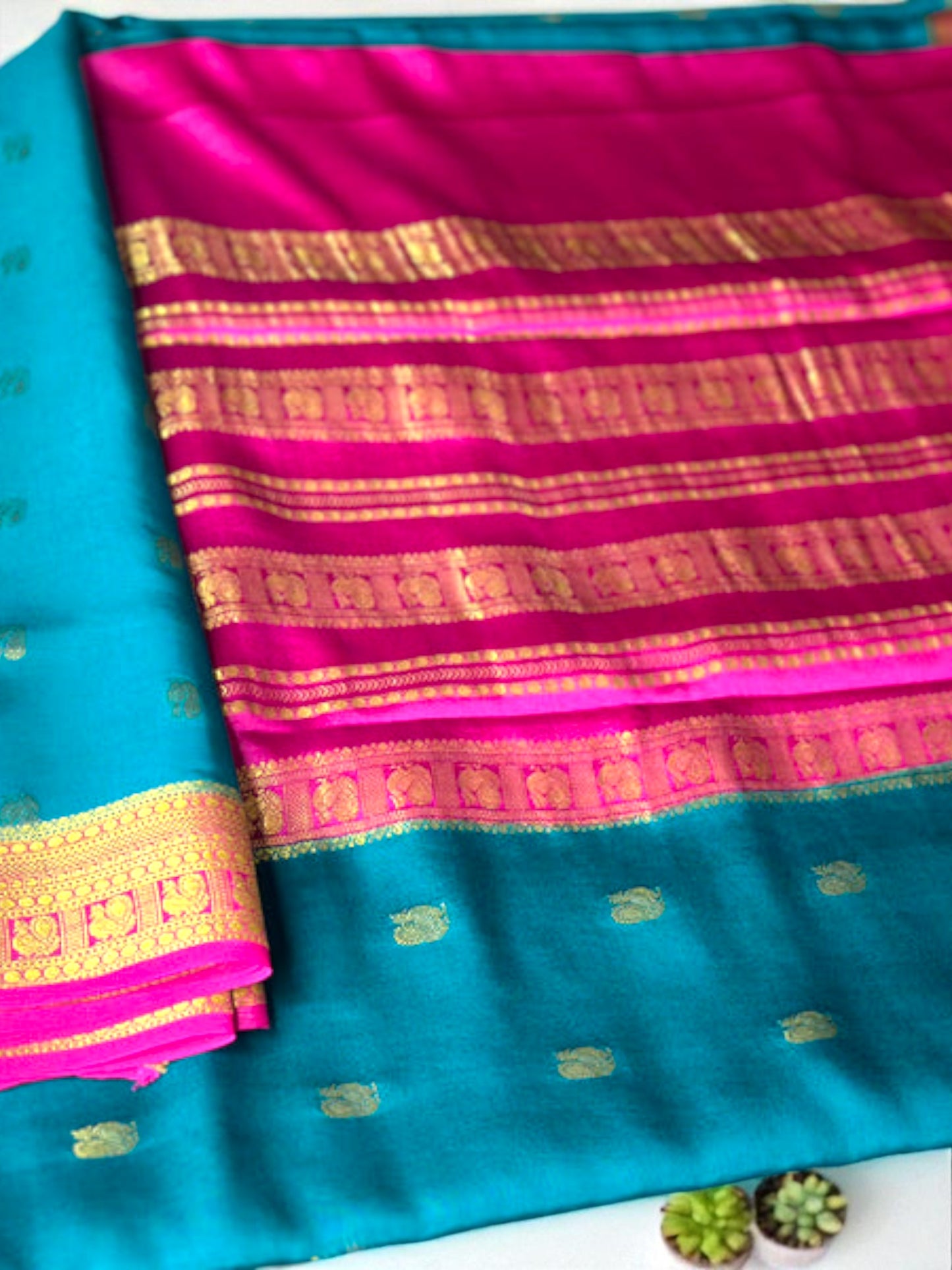 Peacock green- magenta butta pure crepe swan silk saree