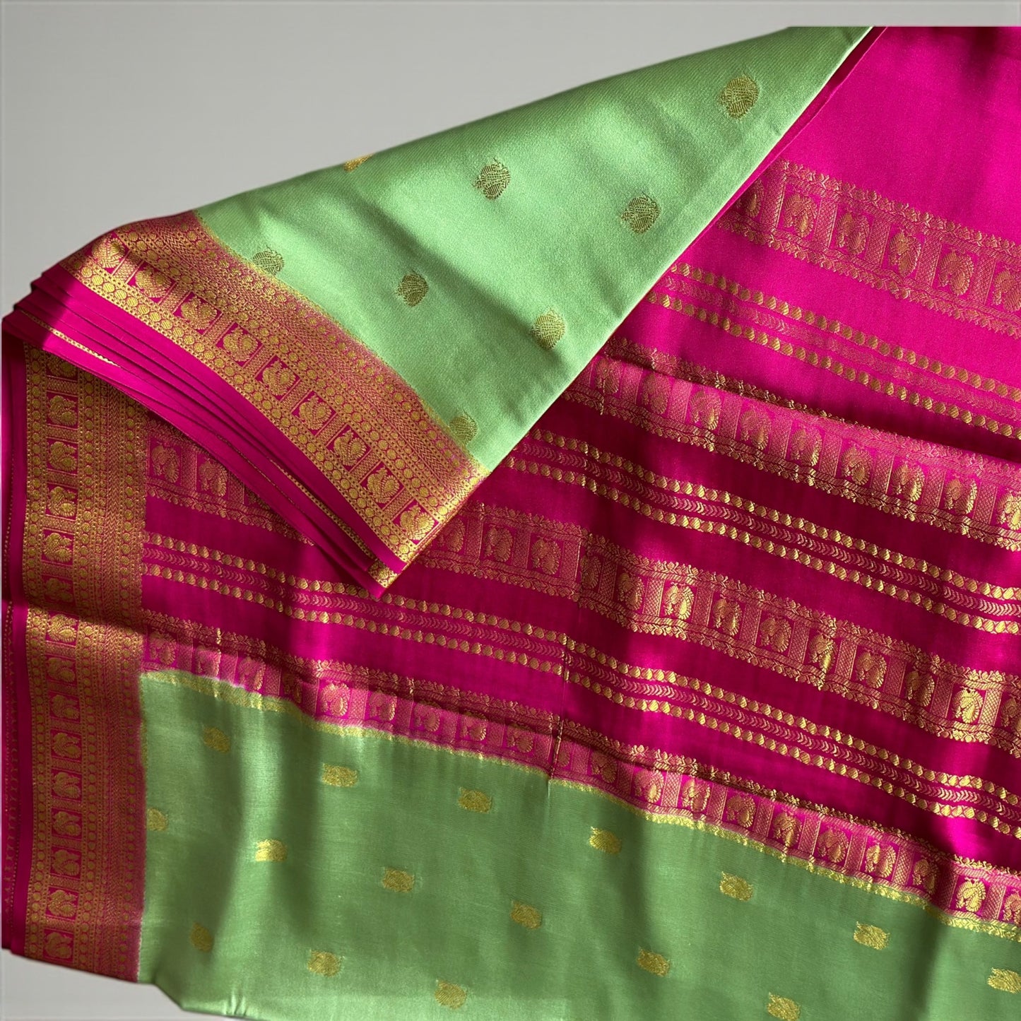 Mint green-magenta pure crepe swan silk saree