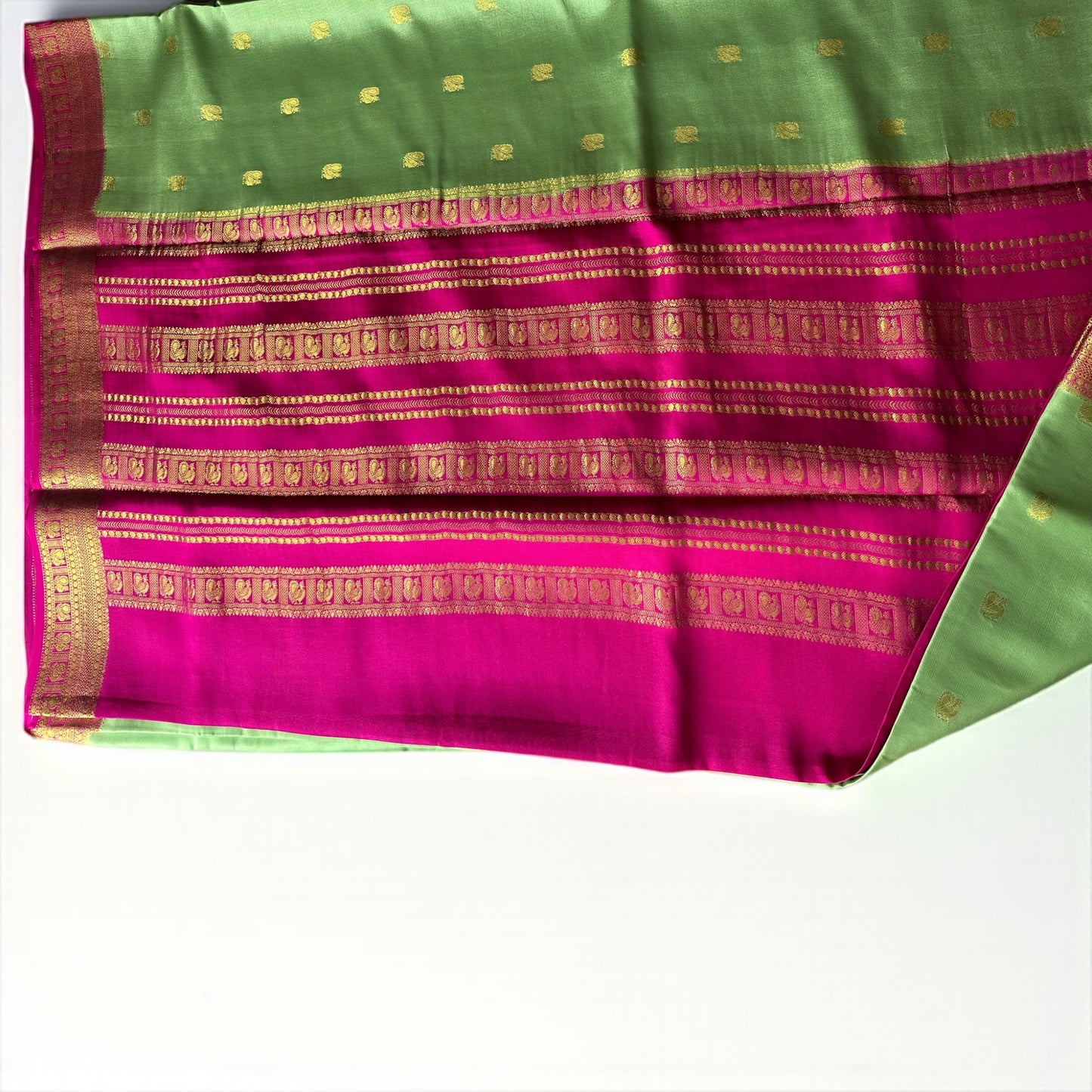 Mint green-magenta pure crepe swan silk saree